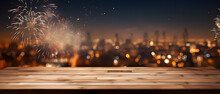 Empty Wooden Table With Blurred Background With A City With Fireworks On New Year's Eve