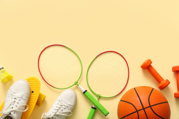 Poster - Set of sports equipment with shoes on color background