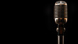 Vintage microphone on black background with copy space for text. Retro style  mic isolated on black background