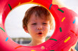 © N_studio - Portrait boy holding swim ring in swimming pool, children playing water in swimming pool with relax and enjoy, activity in weekend, happiness child or kid leisure in summer, vacations and hobby.