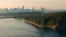 Aerial View Of Lions Gate Bridge And Stanley Park At Dawn. Canada