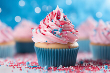 Delicious Cupcake Decorated With Blue And Pink Frosting And Colorful Sprinkles. Dessert Served At Gender Reveal Or A Baby Shower Party.