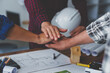 stack hands of business engineering and architect teamwork join together, construction engineer working site, construction engineer conceptual,architect drawing on the architectural project