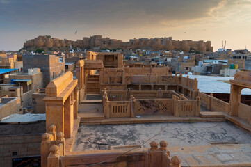 Wall Mural - Jaisalmer, Rajasthan, India - 16 th October 2019 : View of Jaisalmer city and famous Jaisalmer fort, from the roof top of Patwon ki Haveli, ancient palace and UNESCO world heritage building.