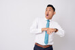© Bangun Stock Photo - Surprised employee businessman corporate lawyer wearing formal shirt tie checks time work in an office because late work isolated on white background