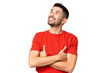 © luismolinero - Young handsome caucasian man over isolated chroma key background looking up while smiling