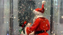 Santa Claus And A Snow Man Dancing Christmas Snow Globe Decoration
