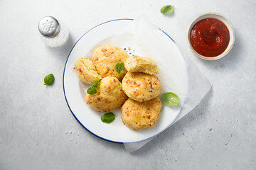 Wall Mural - Homemade cheese scones with tomato sauce