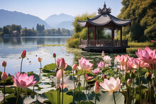 Chinese Gazebo In The Distance On A Lake With Blooming Pink Lotuses, Mountains In The Background