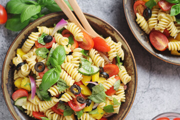 Wall Mural - A bowl with traditional Italian pasta salad	