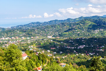 Sticker - travel to Georgia - view of suburbs of Batumi city from Sameba hill on sunny autumn day