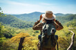  Hikers engage in birdwatching in a national park, observing diverse bird species with binoculars and guidebooks, appealing to nature enthusiasts.
