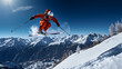 skier jumping on the slope in the mountains - wintersport. 