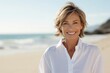 © Danko - Portrait of beautiful 50-year-old blond woman on the beach