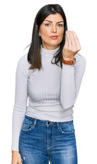 Poster - Beautiful brunette woman wearing casual clothes doing italian gesture with hand and fingers confident expression