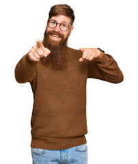 Canvas Print - Young irish redhead man wearing casual clothes and glasses pointing to you and the camera with fingers, smiling positive and cheerful