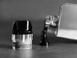 The electronic cigarette device is very close, black and white image