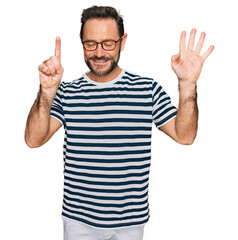 Poster - Middle age man wearing casual clothes and glasses showing and pointing up with fingers number six while smiling confident and happy.