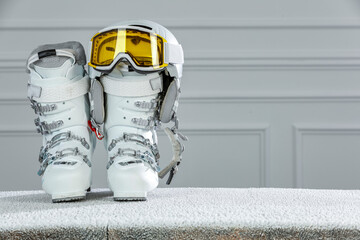 Poster - Desk of free space and ski shoes. Winter time and cold december time. 