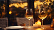 Dinner in a chic restaurant, on the terrace in the fresh air, by candlelight with a glass of champagne or wine, with beautiful glowing lights.