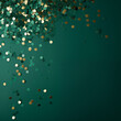 gold and green confetti on plain green studio background