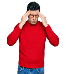 Wall Mural - Handsome hispanic man wearing casual clothes and glasses with hand on head for pain in head because stress. suffering migraine.