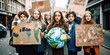 © koldunova - Young activists holding placards and campaigning for environmental issues, concept of Sustainability