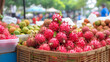Dragon fruits in basket at street market in thailand. Exotic tropical fruits background.