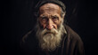 Old homeless bearded man, sad and emotional look, close-up portrait of poor elderly person