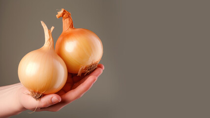 Wall Mural - Hand holding onion vegetable isolated on pastel background