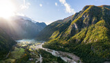 Fototapeta  - Aerial Panorama over Theth Village in the Northern Albanian Alps with Beautiful Sunbeams