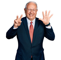 Poster - Senior man with grey hair wearing business suit and glasses showing and pointing up with fingers number seven while smiling confident and happy.