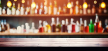 Empty Wooden Bar Counter On Alcohol Bottles Background. Banner