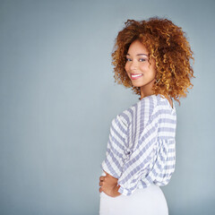 Poster - Portrait, happy and confident business woman isolated on a gray background mockup space. Smile, professional and young designer, creative female entrepreneur and employee working at startup in Brazil