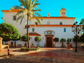 Wall Mural - View of  Iglesia Mayor de la Encarnacion which is the main church hidden in the old town of Marbella center, Spain.