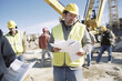 © ADDICTIVE STOCK - Generative AI image of a construction site manager with plans