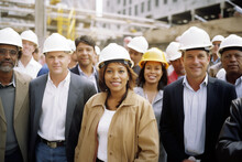 Diverse Team Of Professionals On A Construction Site