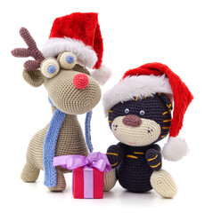 Sticker - Knitted deer and tiger in Christmas hats.