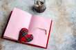 © ADDICTIVE STOCK - Plaid Heart Bookmark in Open Book Generative AI