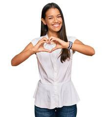 Poster - Beautiful hispanic woman wearing casual clothes smiling in love showing heart symbol and shape with hands. romantic concept.