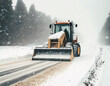 Winter snow removal on the road with an excavator
