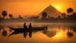 Egyptian Fish-man catching a fish in Nile river at early morning. Sunrise at the background