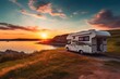 Family vacation travel RV, holiday trip in motorhome. Motorhome RV parked on the side of the road at sunset