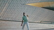 © stockbusters - Charismatic man moving street zoom on. Dancer practicing freestyle choreography