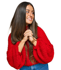 Poster - Beautiful hispanic woman wearing casual clothes laughing nervous and excited with hands on chin looking to the side