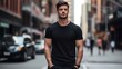 © David - Male model in a classic black cotton T-shirt on a city street