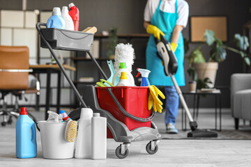 Wall Mural - Trolley with cleaning supplies in office