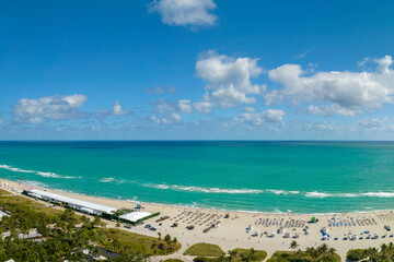 Wall Mural - Miami Beach is popular vacation spot in southern Florida. Sandy beach surface and tourist infrastructure