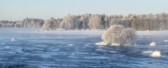 Wall Mural - River landscape with frost and snow. Farnebofjarden national park in north of Sweden.