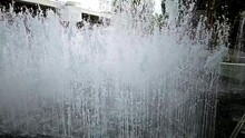 Slow Motion Of A Water Fountain Situated In The Middle Of A Community Mall In Bangkok, Thailand.